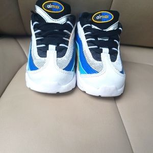 Blue, yellow and black nike sneaker